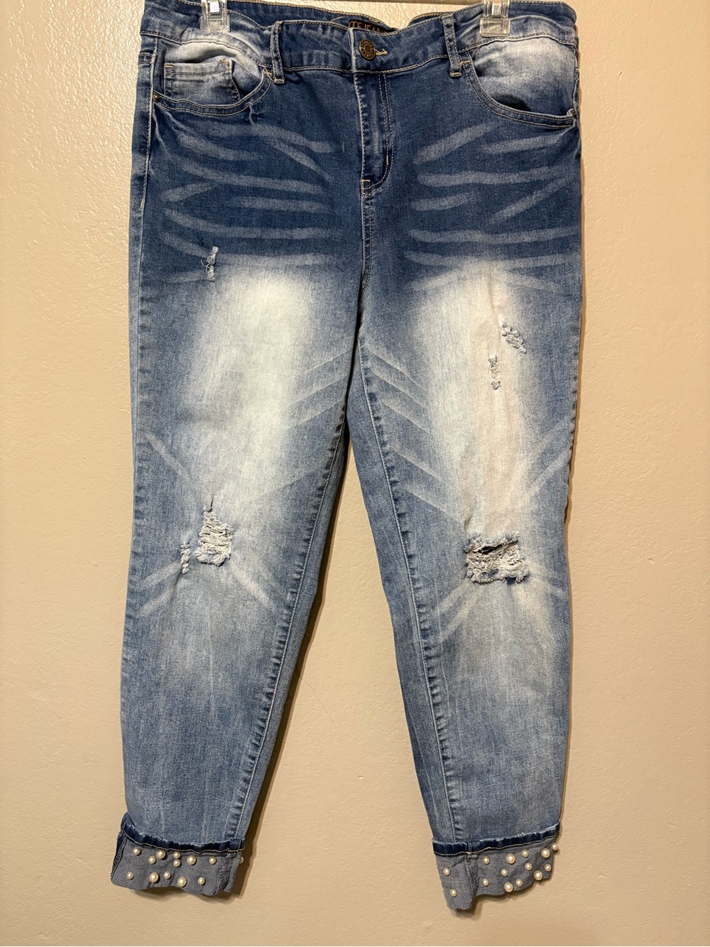Women’s distressed Light Wash Skinny Jeans with Pearl Cuff - Size 15/16